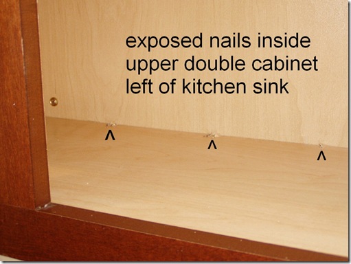 Exposed nails in cabinet