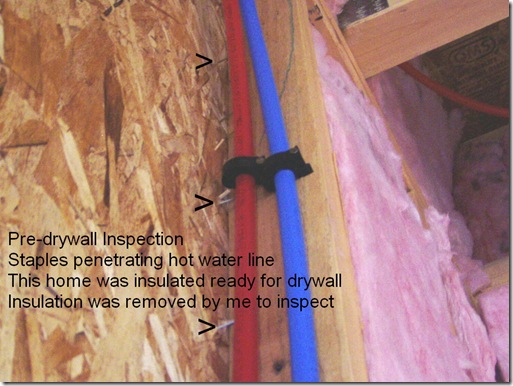 Nails through hot water line